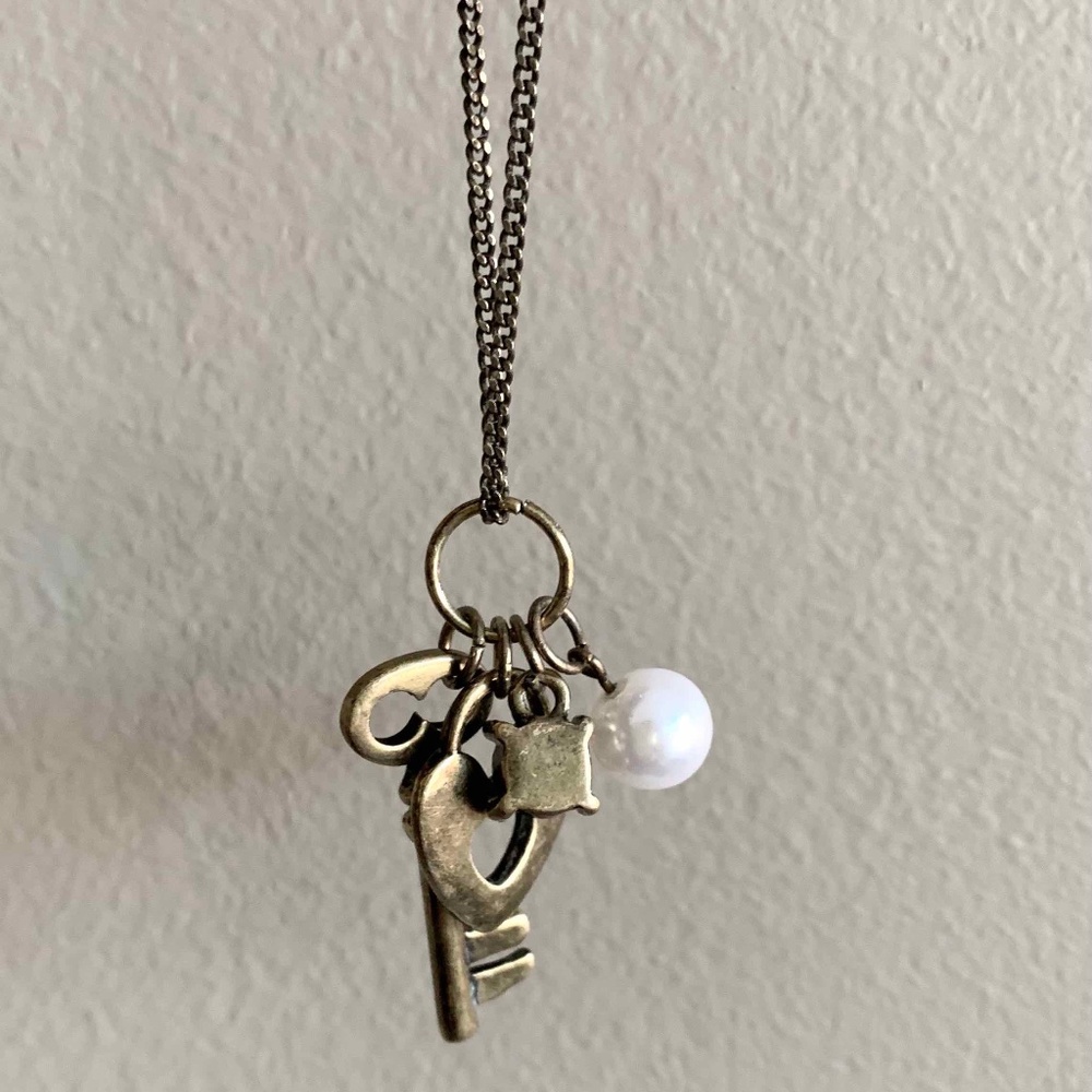 Necklace with key and heart and pearl charms